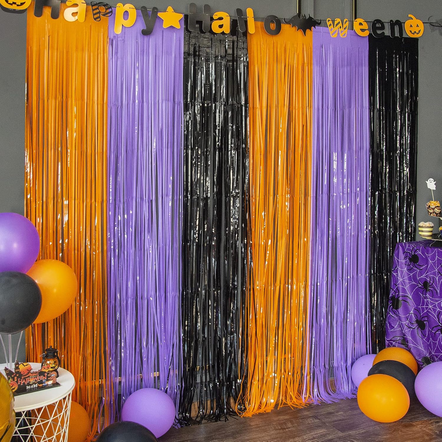 3-pack of tinsel foil fringe curtains at 3.3 x 6.6 ft each (9.9 x 6.6 ft total coverage)