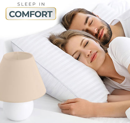 queen pillow dimensions of 28" l x 20" w with sewn-seam closure